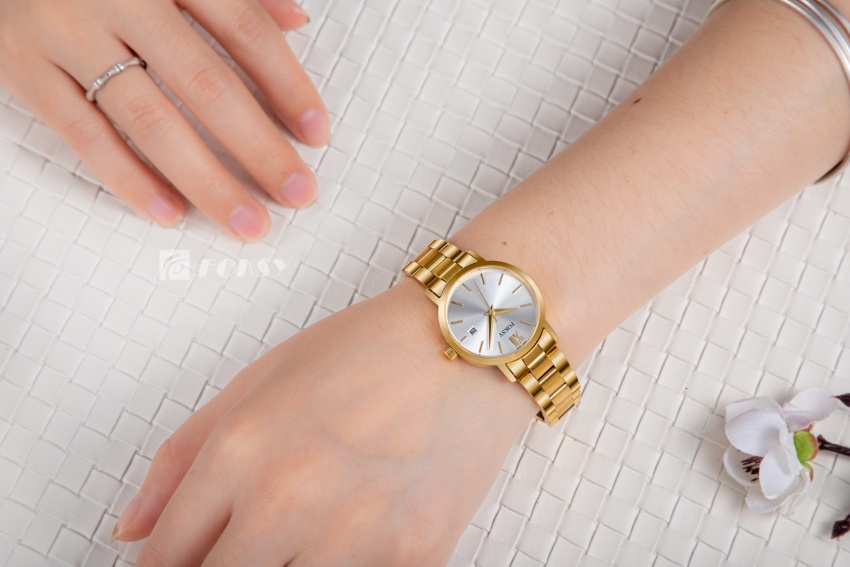 Simple round gold wristwatch